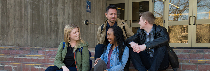 students sitting on stairs