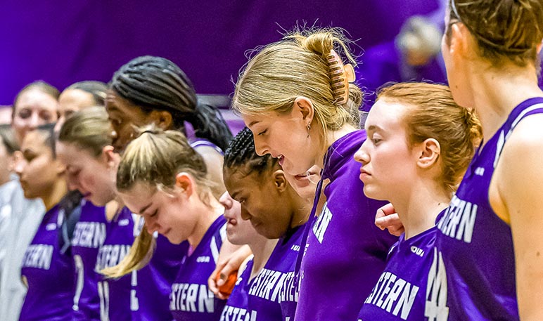 Western Mustangs women’s basketball player dribbling the ball