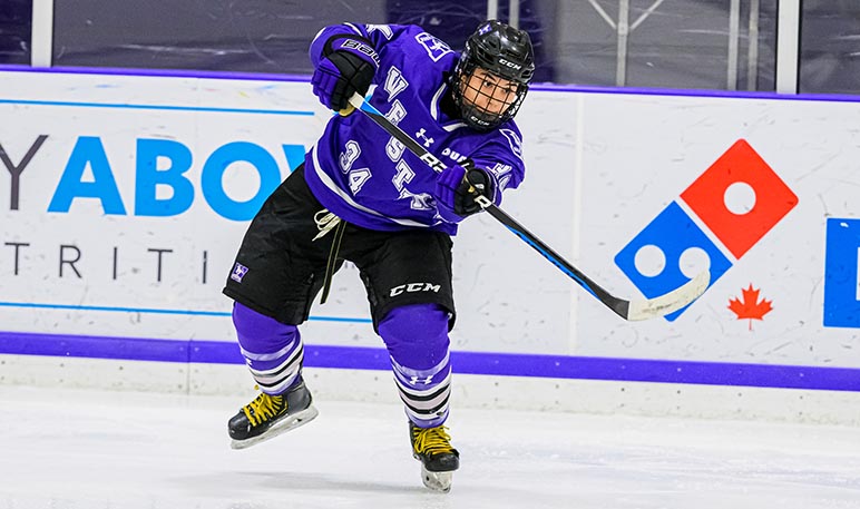 Western Mustangs women’s hockey player skating