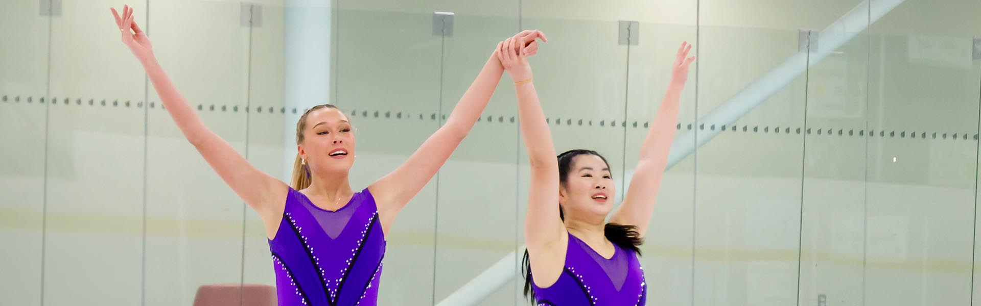 Pair of Western Mustangs figure skaters performing