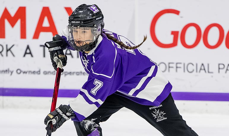 Western Mustangs ringette coach and player smiling