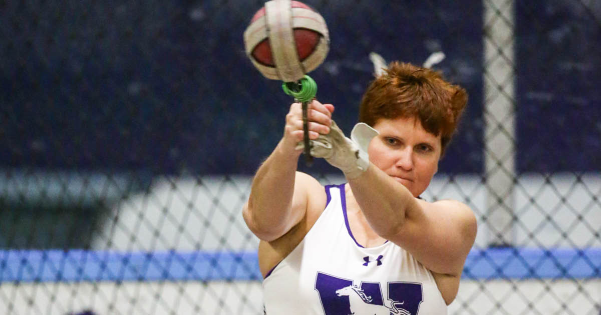 Western Mustangs female hammer thrower mid-spin