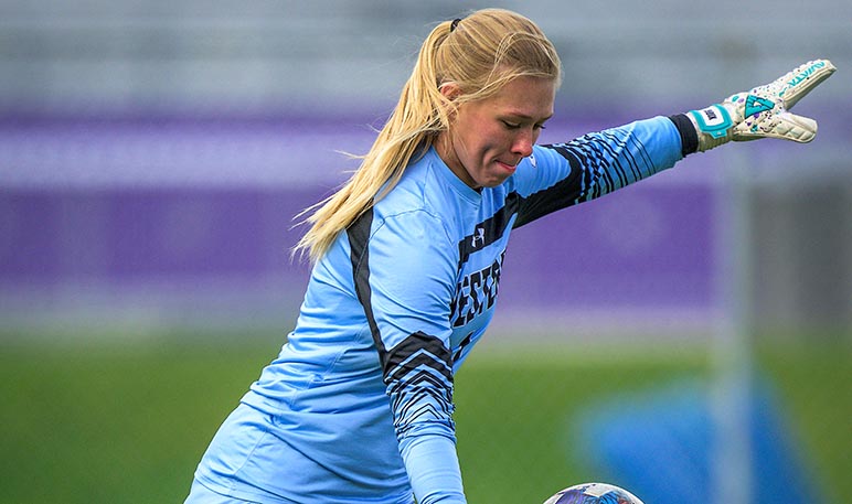 Western Mustangs women’s soccer player running