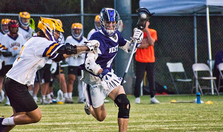 Western Mustangs men’s lacrosse player running