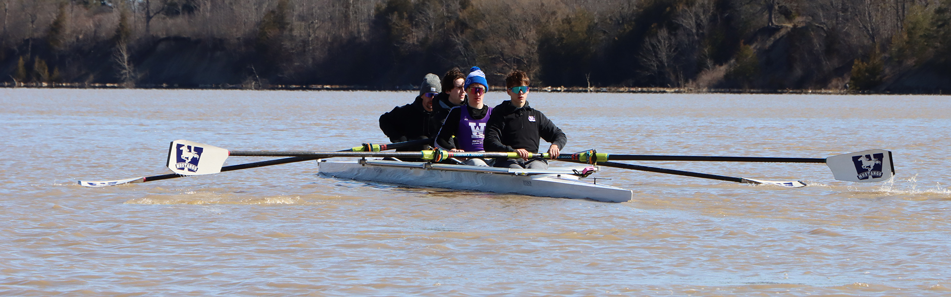 Western athletes rowing