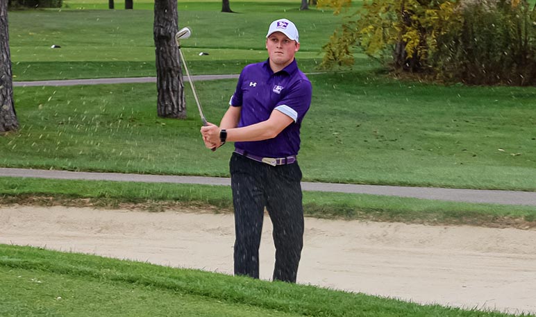 Men's golf player swinging club