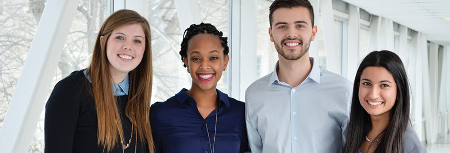 4 smiling students