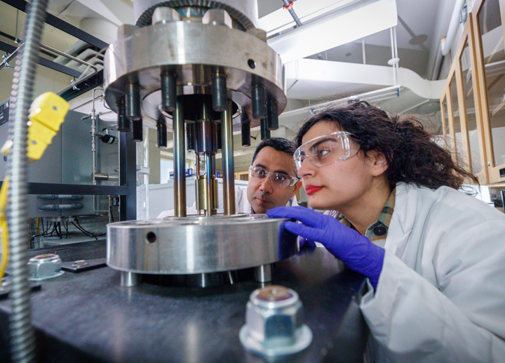 A student working iwtha centrifuge