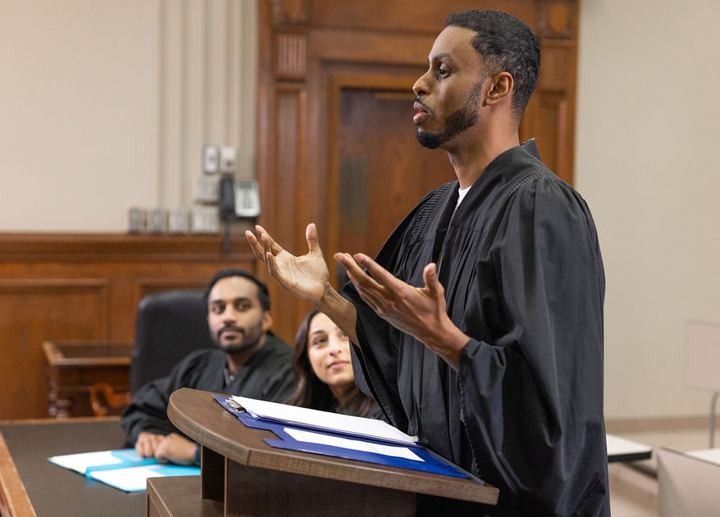 A student in court presenting