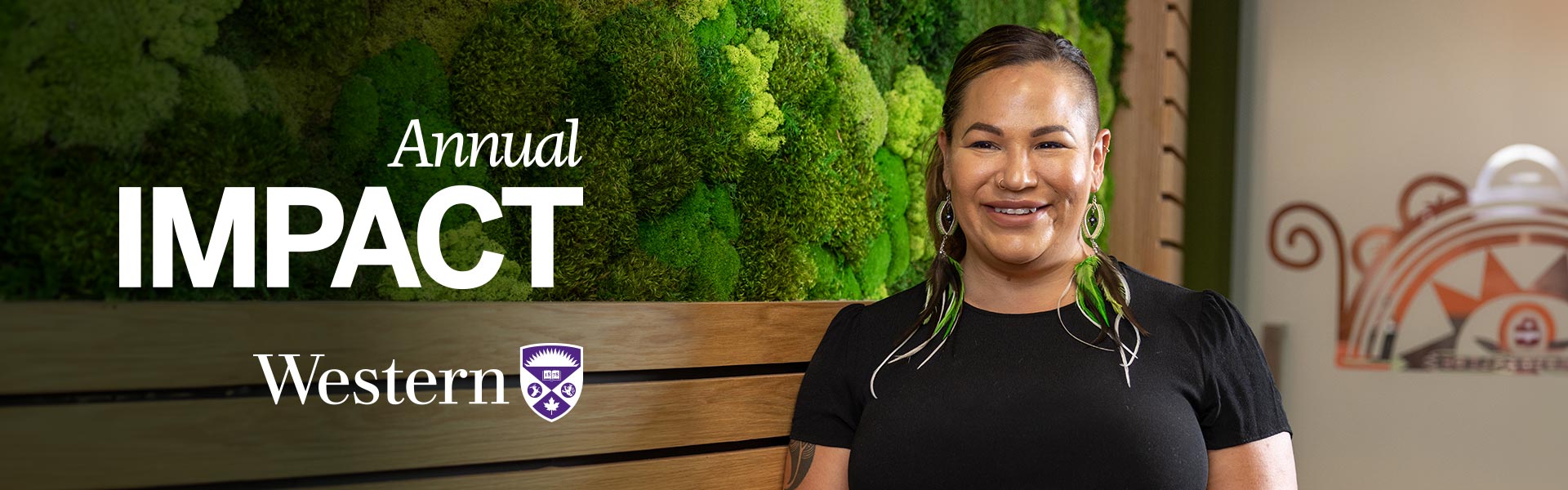 Vanessa Ambtman-Smith smiles in front of a green living wall, text reads 